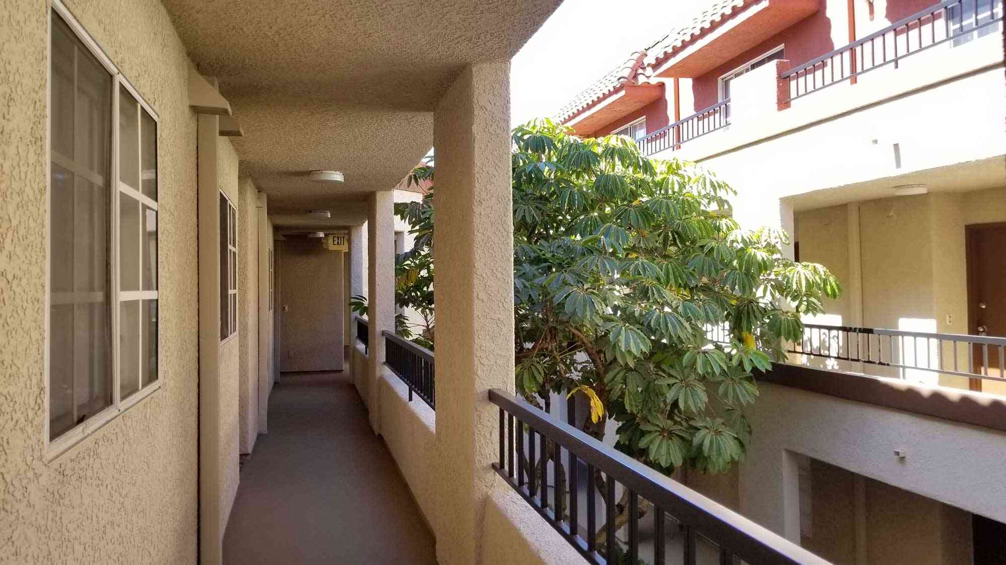 outdoor hallway balcony railing