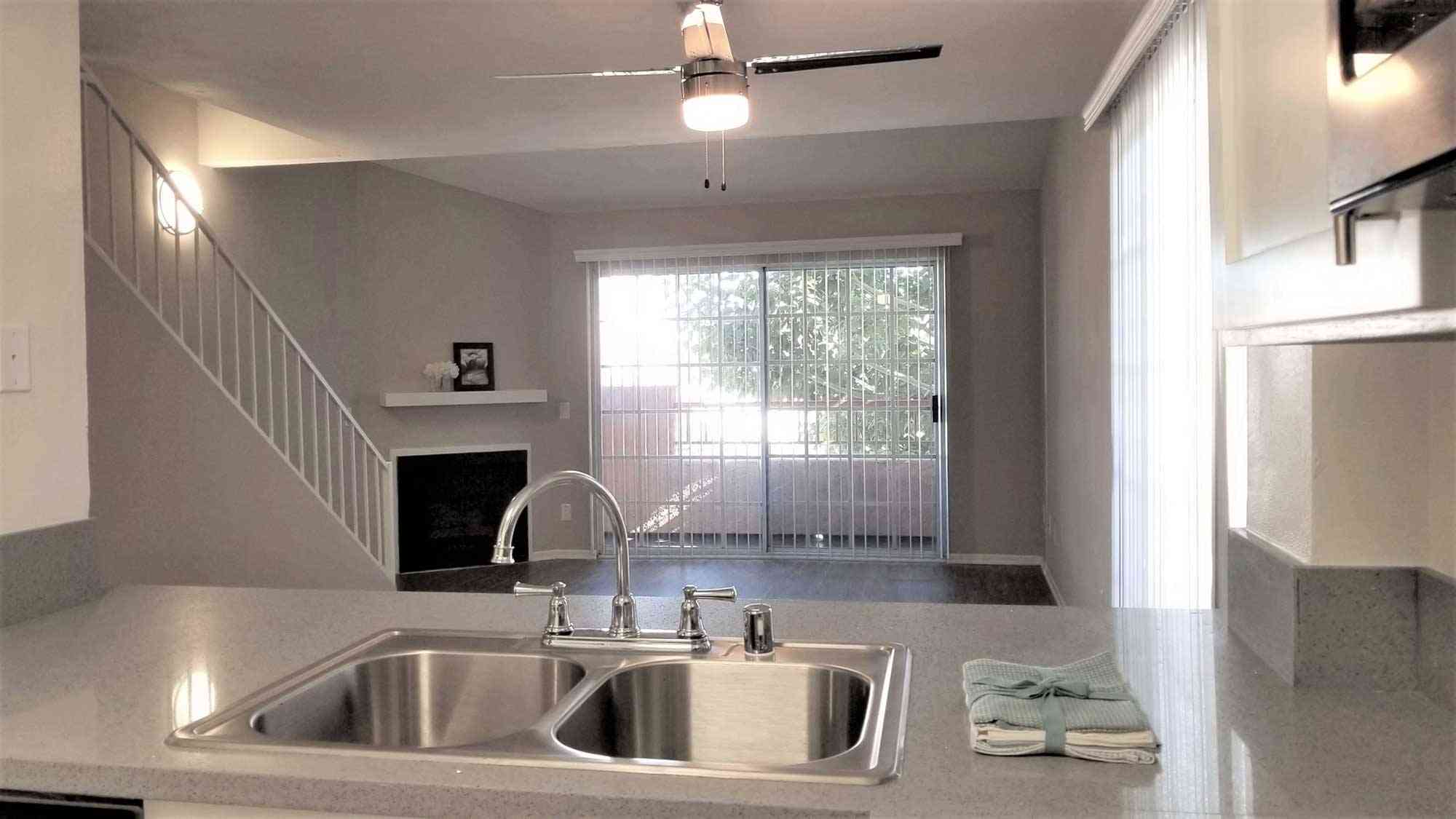 living room fireplace and patio access