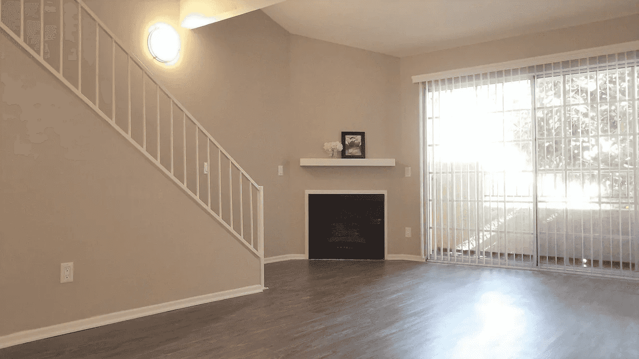 living room stairs and fireplace