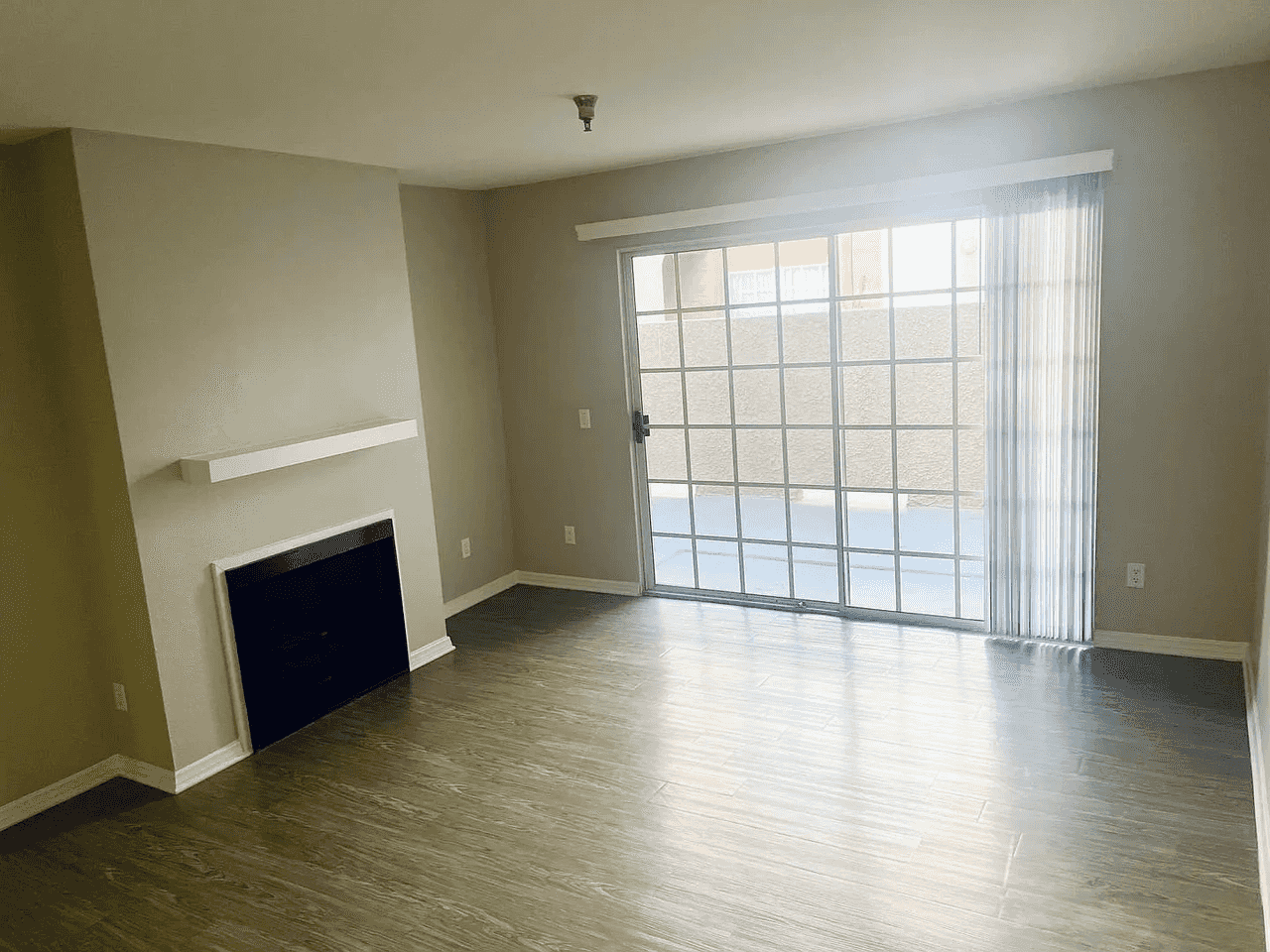 living area with fireplace and sliding glass door